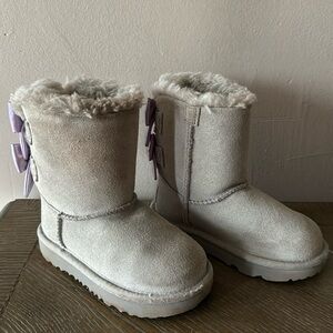 UGG gray boots with lavender bows. Little girl size 9